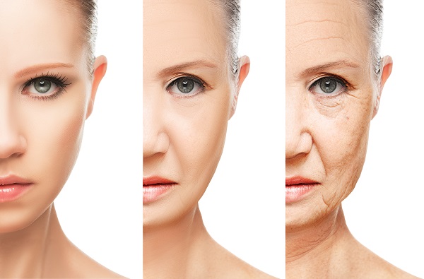 concept of aging and skin care. face of young woman and an old woman with wrinkles isolated